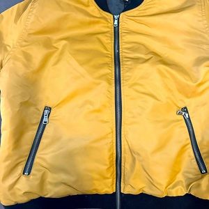 Forever 21 bomber jacket. Light weight and durable. Dark khaki/ goldish color.